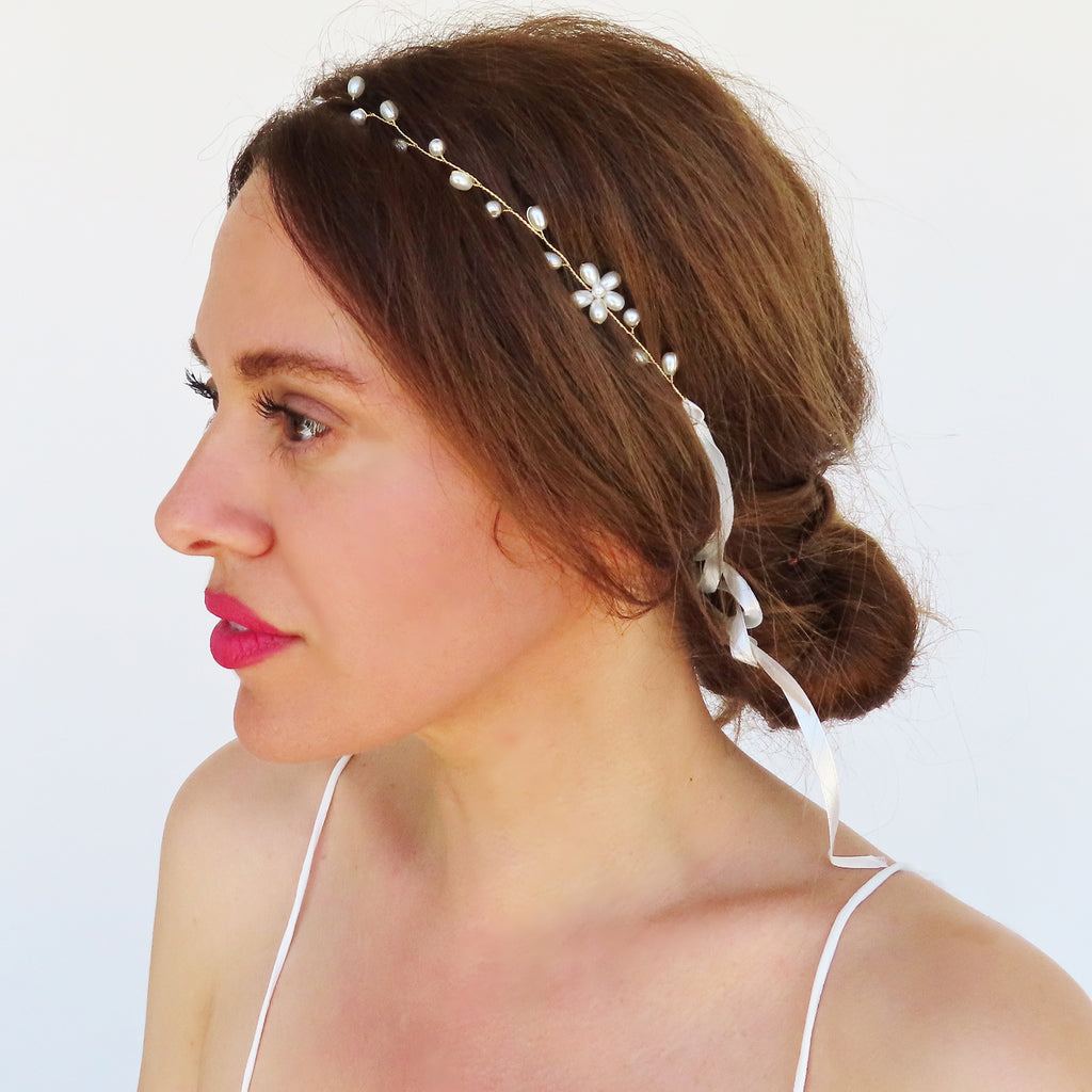 asymmetrical pearl headpiece with pearl flower and satin ribbon ties