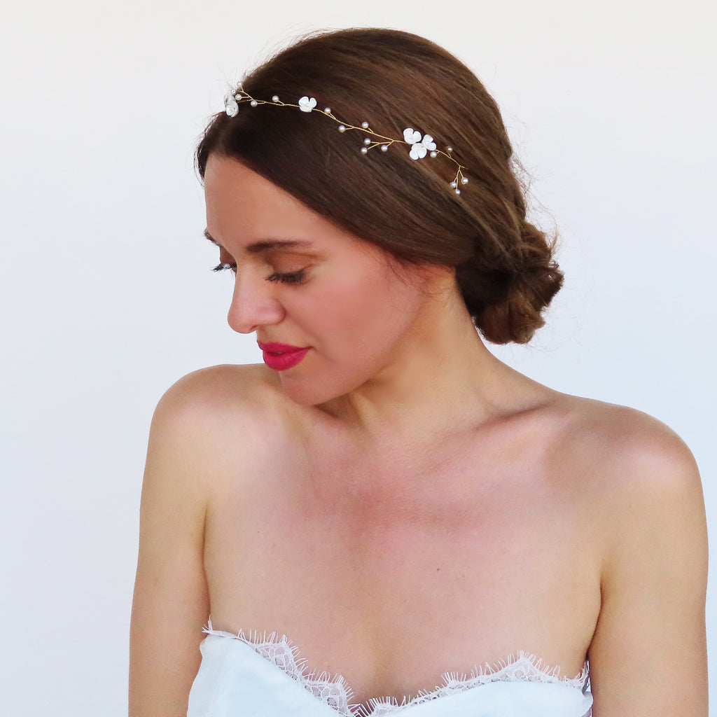 gold bridal head piece with dainty white flowers and pearl